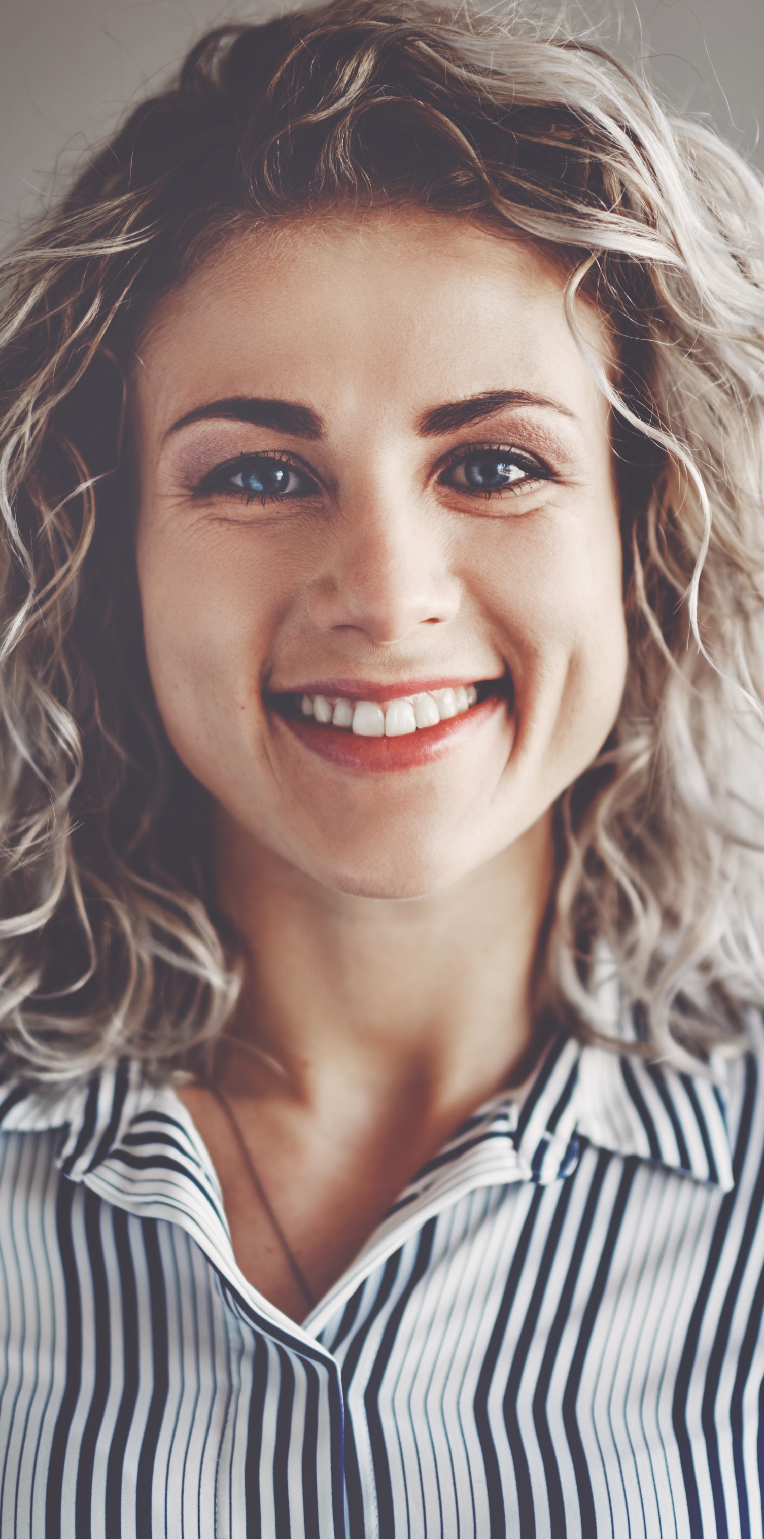 Woman Wearing a Striped Shirt